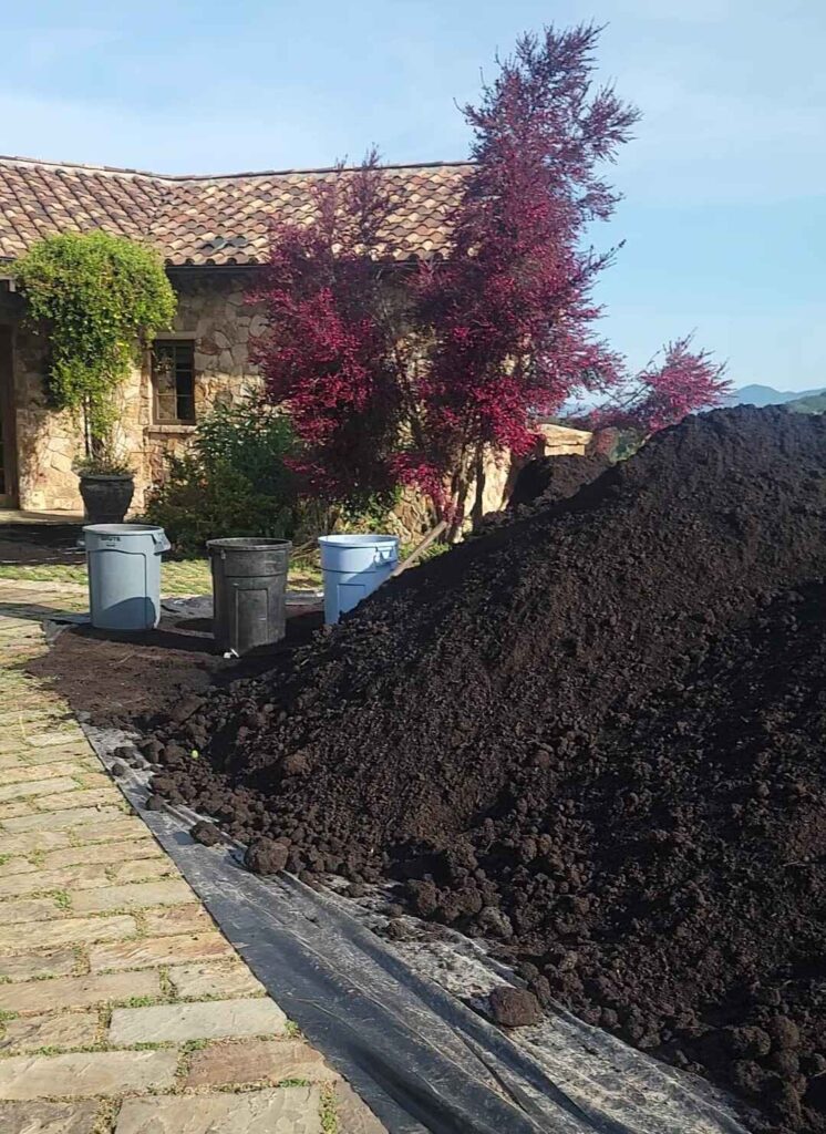 Compost mulch delivered and ready to install at one of our maintenance client’s properties.