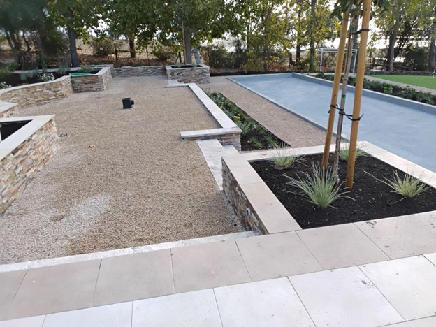 A combination of aggregate and paved hardscape surfaces in a landscape in Calistoga.