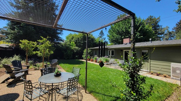 Steel pergola built by Inspired Landscapes in Healdsburg with trellis for vines to grow over to create shade.